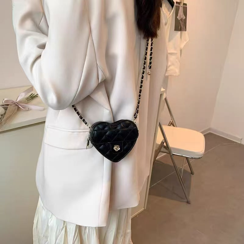 Amorette black heart crossbody bag, lifestyle view