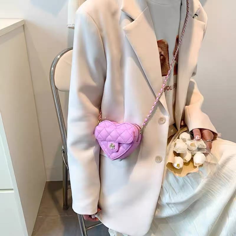 Amorette lilac mini bag, seated lifestyle view