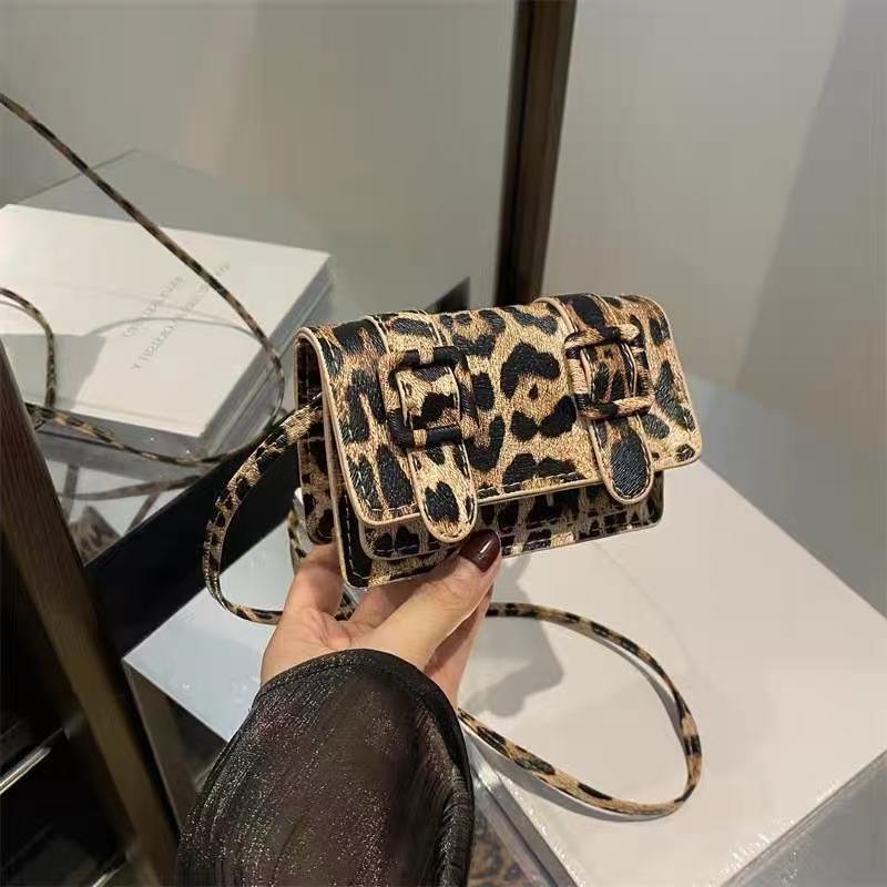 Amoirelle Fia leopard print mini satchel with twin buckle details